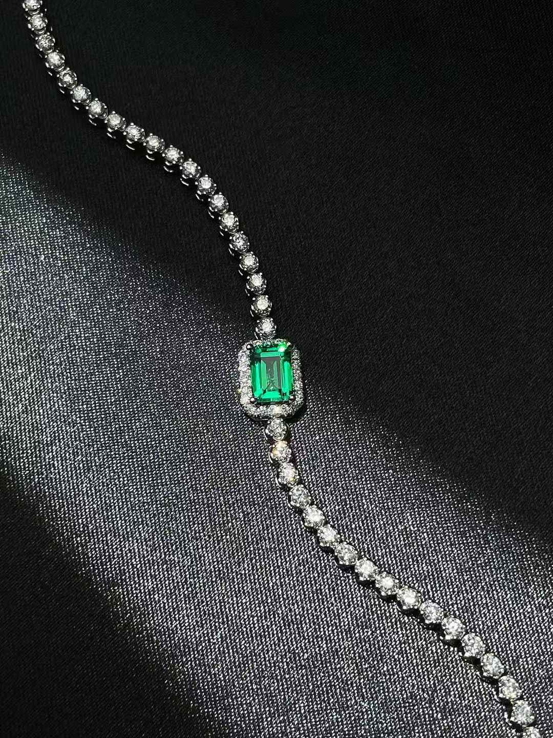 The "Verdant Empress" Green Diamond Platinum Tennis Bracelet